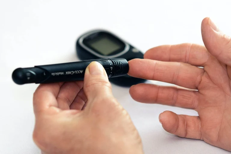 A patient is remotely monitoring blood sugar levels. 