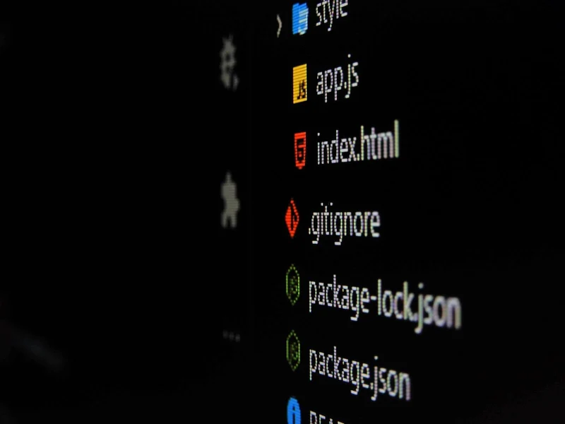 A close-up photo of a computer screen showing a code editor.
