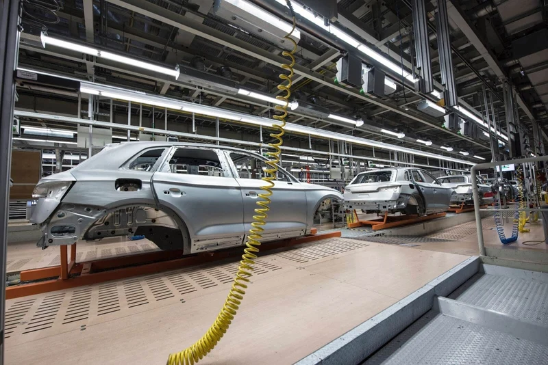 Picture depicting a car assembly line 